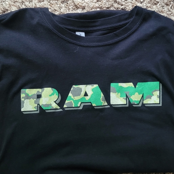 Other - "NEW"  RAM Truck t-shirt with camouflage lettering, size L.